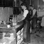 Wrapping bottles prior to packaging in returnable wooden cases